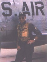 Gordon Henrie standing beside a U.S. Air Force aircraft
